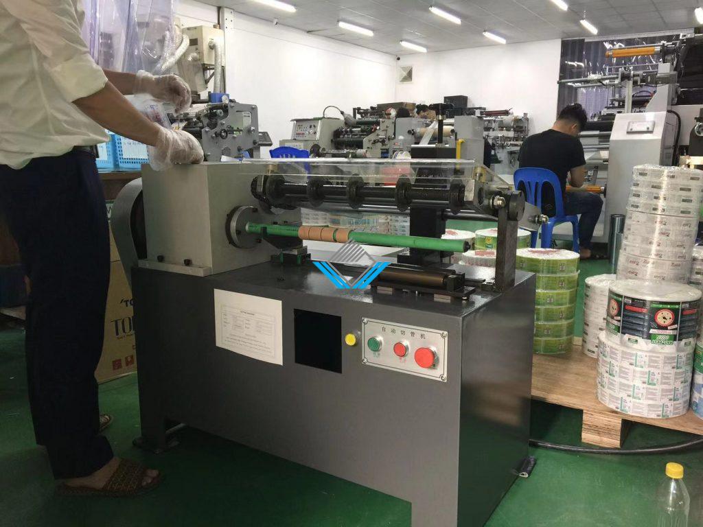 Máy cắt ống giấy tự động 
